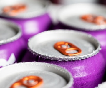 purple beer cans with condensation 